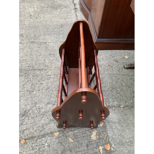 3123 - A MAHOGANY AND CROSS BANDED LAMP TABLE ENCLOSING DRAWER AND MAGAZINE RACK