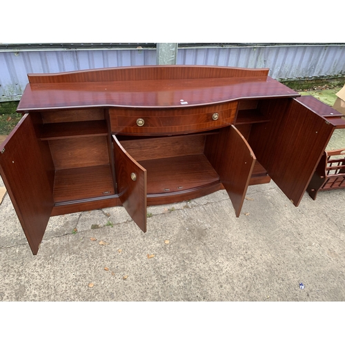 3124 - A MAHOGANY AND CROSSBANDED BOW FRONTED STAG SIDEBOARD ENCLOSING FOUR CUPBOARDS AND ONE DRAWER 68