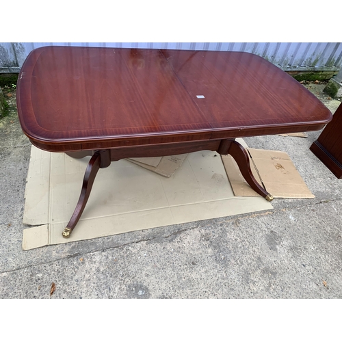 3125 - A STAG TWIN PEDESTAL MAHOGANY AND CROSS BANDED EXTENDING TABLE 64