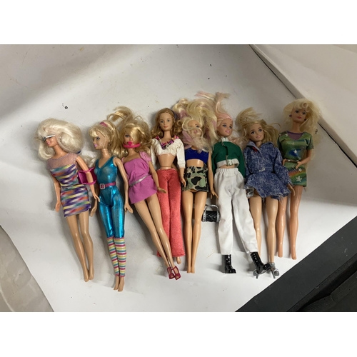 402 - EIGHT DRESSED BARBIE DOLLS