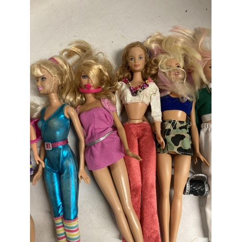 402 - EIGHT DRESSED BARBIE DOLLS