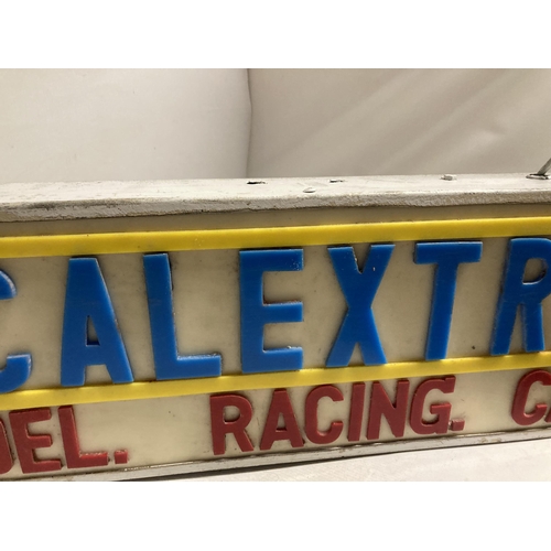 417 - A SCALEXTRIC MODEL RACING CARS ILLUMINATED SIGN 
L=76CM H=10CM D=24CM