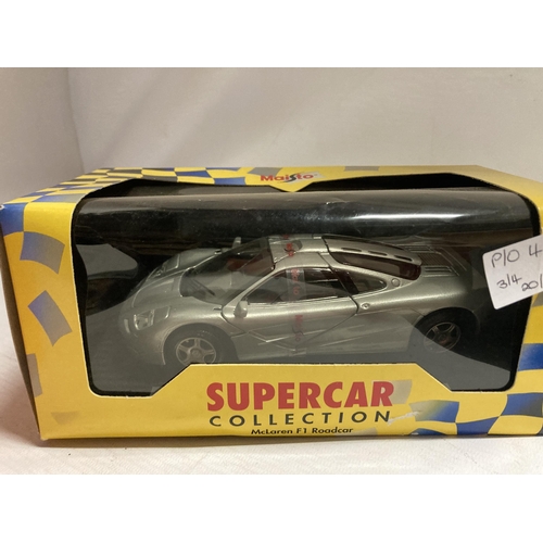 429 - FOUR LARGE BOXED CARS TO INCLUDE REVELL PORSCHE 959,GEMBALLA AVALANCH,MAISTO MCLAREN AND MAJORETTE M... 