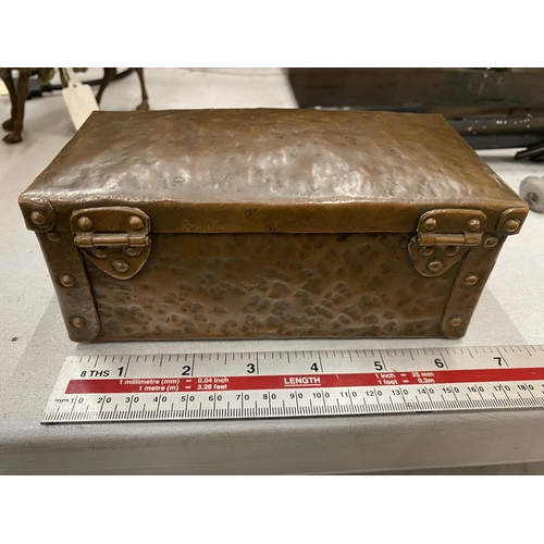 4 - AN ARTS AND CRAFTS HAMMERED COPPER AND RIVETED TRUNK STYLE BOX 16CM LONG