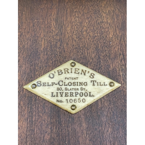 31 - AN O BRIENS SELF CLOSING TILL 80 SLATER STREET LIVERPOOL NO.10650 (A/F)