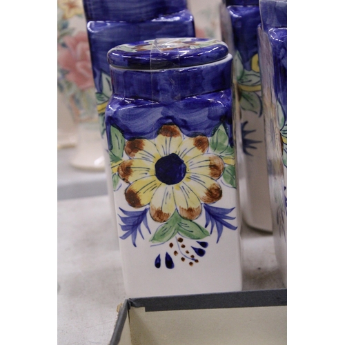 174 - FOUR CERAMIC HANDPAINTED STORAGE JARS