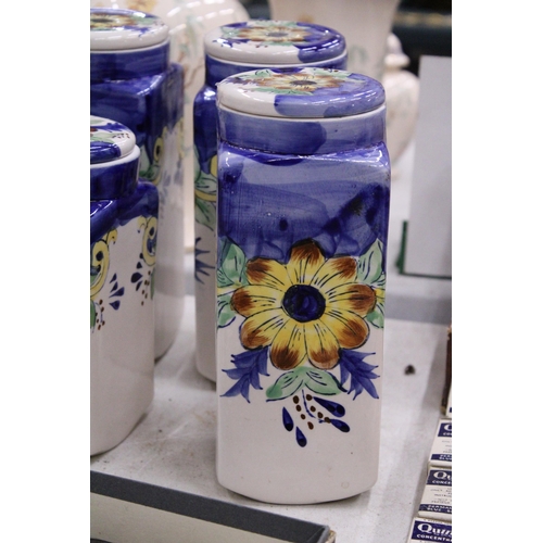 174 - FOUR CERAMIC HANDPAINTED STORAGE JARS