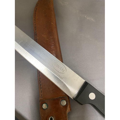 402 - A SABATIER KNIFE AND LEATHER SHEATH TOGETHER WITH A SWAN KNIFE AND SHEATH