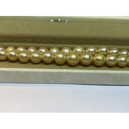 521 - A DOUBLE STRING OF LOTUS PEARLS IN A PRESENTATION BOX