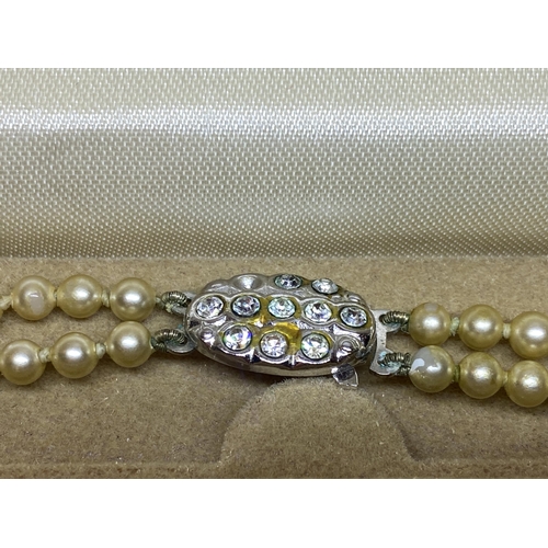 521 - A DOUBLE STRING OF LOTUS PEARLS IN A PRESENTATION BOX