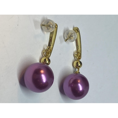 542 - TWO PAIRS OF EARRINGS TO INCLUDE PEARL AND PURPLE PEARL DROPS