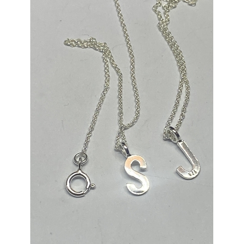 555 - FOUR MARKED SILVER NECKLACES TO INCLUDE INITIALS J AND S AND A GOLD PLATED EXAMPLE