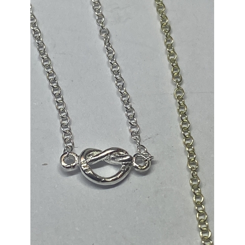 555 - FOUR MARKED SILVER NECKLACES TO INCLUDE INITIALS J AND S AND A GOLD PLATED EXAMPLE