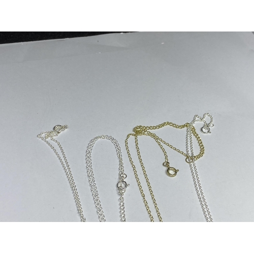 566 - FOUR SILVER NECKLACES WITH PENDANTS TO INCLUDE A GOLD PLATED EXAMPLE