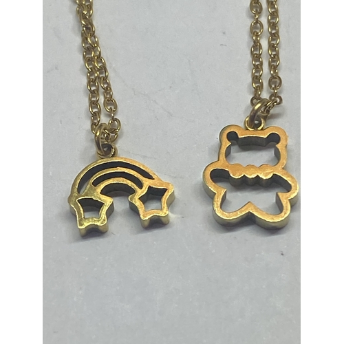 567 - TWO YELLOW METAL NECKLACES WITH PENDANTS