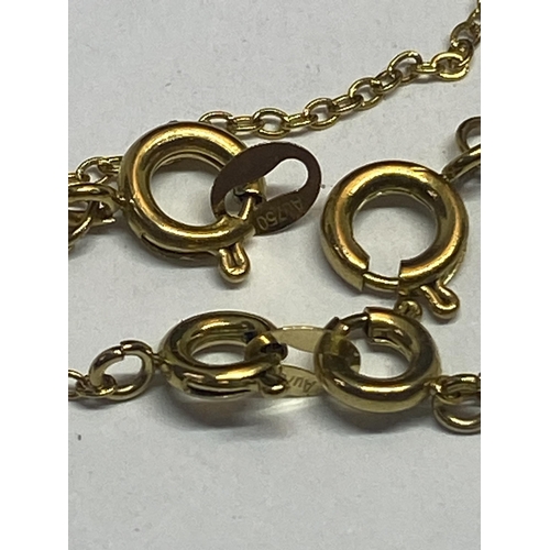 567 - TWO YELLOW METAL NECKLACES WITH PENDANTS