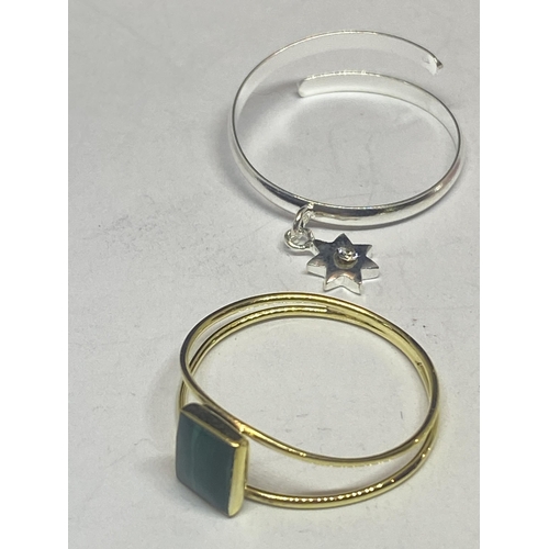 578 - FOUR VARIOUS MARKED SILVER RINGS TO INCLUDE TWO GOLD PLATED