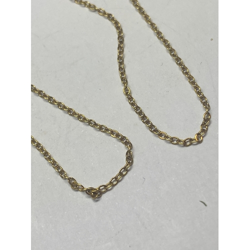 581 - TWO YELLOW METAL NECKLACES