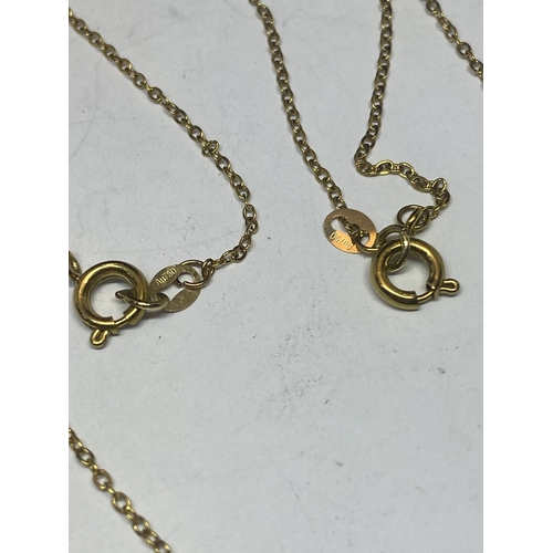 581 - TWO YELLOW METAL NECKLACES