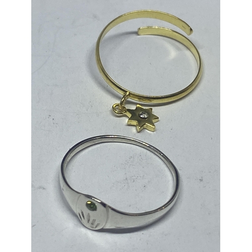 607 - FOUR MARKED SILVER RINGS TO INCLUDE TWO GOLD PLATED