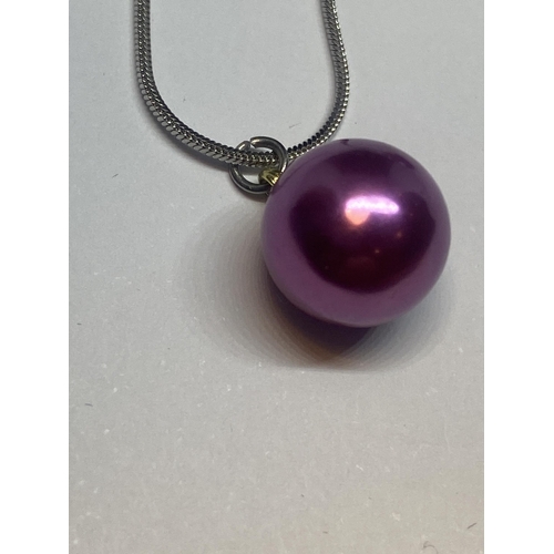 638 - A PAIR OF WHITE METAL AND PURPLE COLOURED PEARL STYLE BALL EARRINGS AND A MATCHING NECKLACE