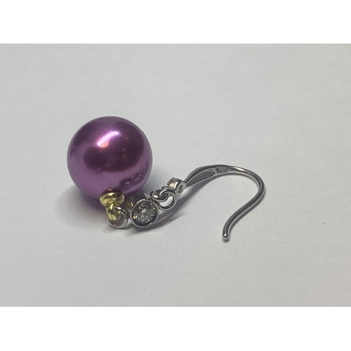 638 - A PAIR OF WHITE METAL AND PURPLE COLOURED PEARL STYLE BALL EARRINGS AND A MATCHING NECKLACE