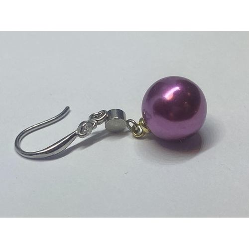 638 - A PAIR OF WHITE METAL AND PURPLE COLOURED PEARL STYLE BALL EARRINGS AND A MATCHING NECKLACE