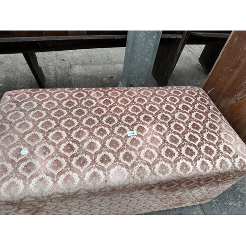 3102 - AN UPHOLSTERED OTTOMAN ON CASTORS 41