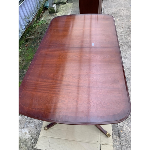 3125 - A STAG TWIN PEDESTAL MAHOGANY AND CROSS BANDED EXTENDING TABLE 64