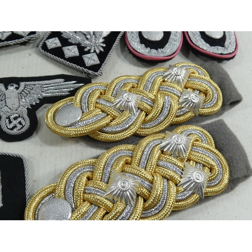 314 - A LARGE COLLECTION OF REENACTOR'S NAZI GERMANY CLOTH BADGES, SHOULDER TABS ETC