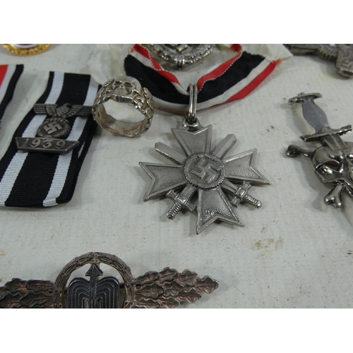 316 - A COLLECTION OF REENACTOR'S NAZI GERMANY BADGES AND MEDALS