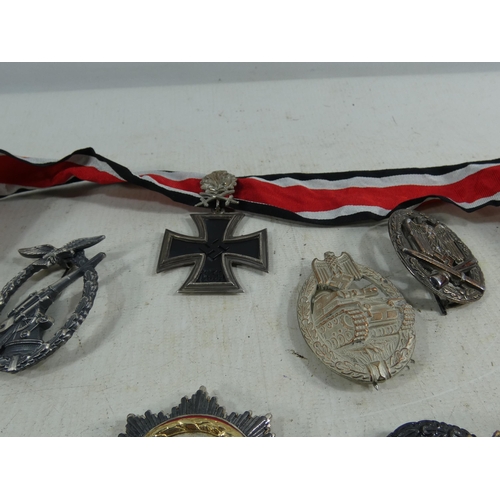 317 - A COLLECTION OF REENACTOR'S NAZI GERMANY MEDALS AND BADGES