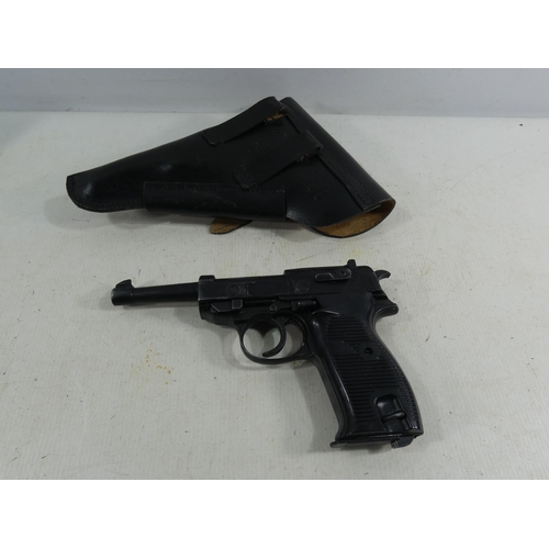 324 - A BLANK FIRING WALTHER SEMI AUTOMATIC PISTOL, AND LEATHER HOLSTER, 7CM BARREL, LENGTH 21CM