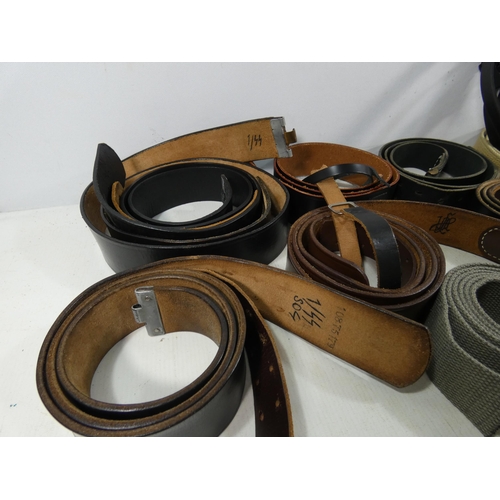 330 - A LARGE COLLECTION OF GERMAN LEATHER AND CANVAS MILITARY BELTS