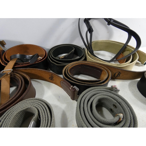 330 - A LARGE COLLECTION OF GERMAN LEATHER AND CANVAS MILITARY BELTS