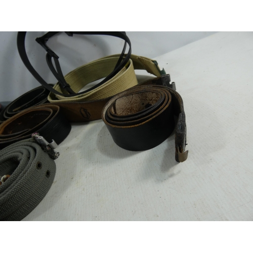 330 - A LARGE COLLECTION OF GERMAN LEATHER AND CANVAS MILITARY BELTS