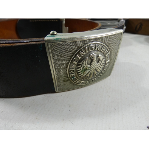 330 - A LARGE COLLECTION OF GERMAN LEATHER AND CANVAS MILITARY BELTS