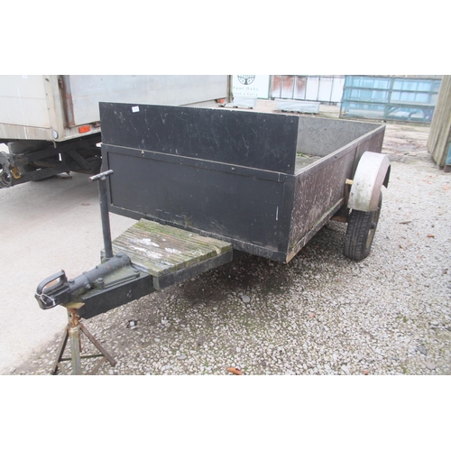 214 - A SMALL BROWN WOODEN SINGLE AXLE CAR TRAILER (L:8FT) NO VAT