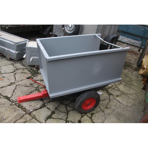 219 - A SMALL METAL RIDE ON LAWN MOWER TRAILER NO VAT