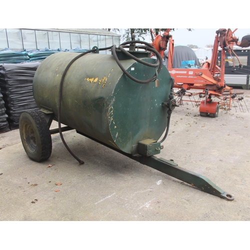 291 - A GREEN METAL SINGLE AXLE TRAILED BOWSER NO VAT