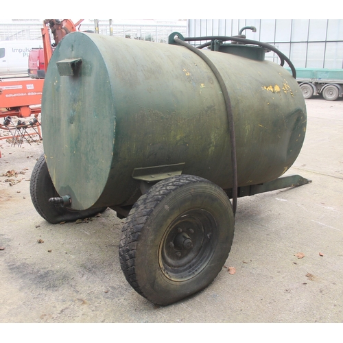 291 - A GREEN METAL SINGLE AXLE TRAILED BOWSER NO VAT