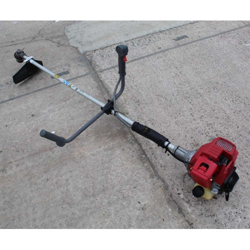 73 - HONDA BRUSH CUTTER  PLUS VAT