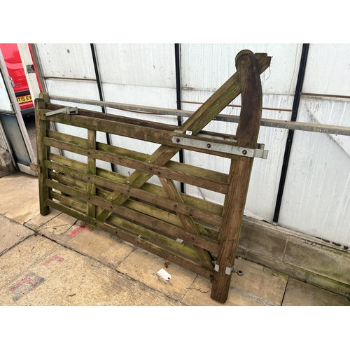 154 - A PAIR OF WOODEN GATES 7' EACH NO VAT