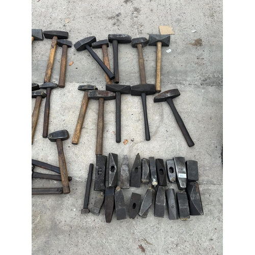 300 - A COLLECTION OF OVER 100 BLACKSMITHS AND SWAYERS HAMMERS AND TOOLS NO VAT