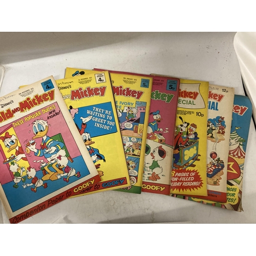 481 - SIXTY VINTAGE ISSUES OF WALT DISNEY'S DONALD AND MICKEY COMICS FROM THE 1970'S