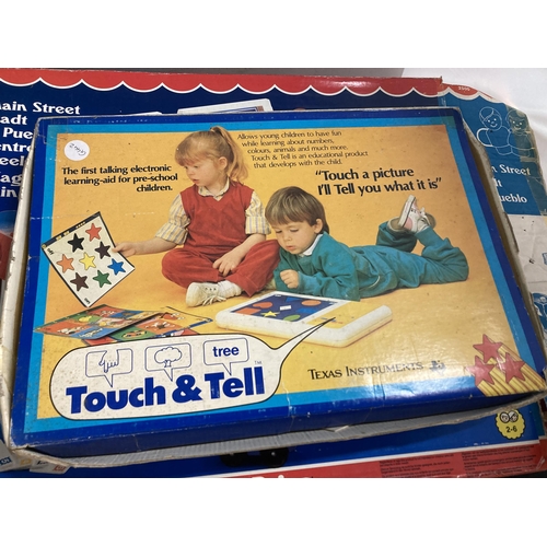 487 - A LARGE FISHER-PRICE MAIN STREET TOY PLUS A 'TOUCH AND TELL' TALKING ELECTRONIC LEARNING AID FOR PRE... 