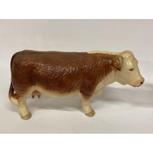 826 - A LARGE HEREFORD BULL AND COW IN A MATT FINISH TOGETHER WITH A CALF