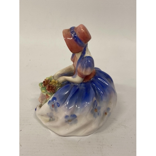 819 - A ROYAL DOULTON FIGURINE 