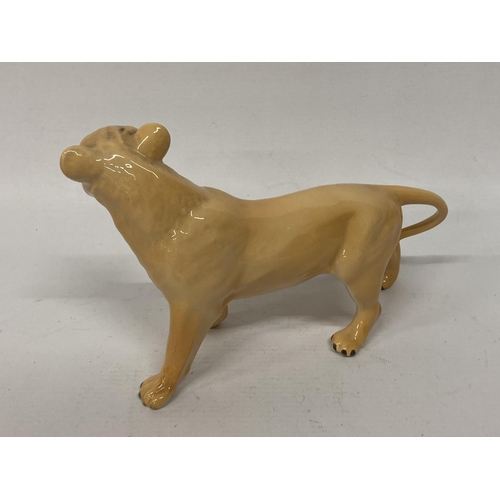 823 - A LARGE BESWICK LIONESS AND CUB