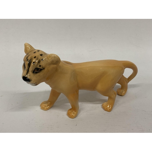 823 - A LARGE BESWICK LIONESS AND CUB